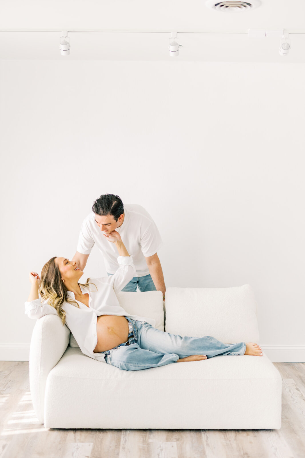 Expecting parents during maternity session in Dallas