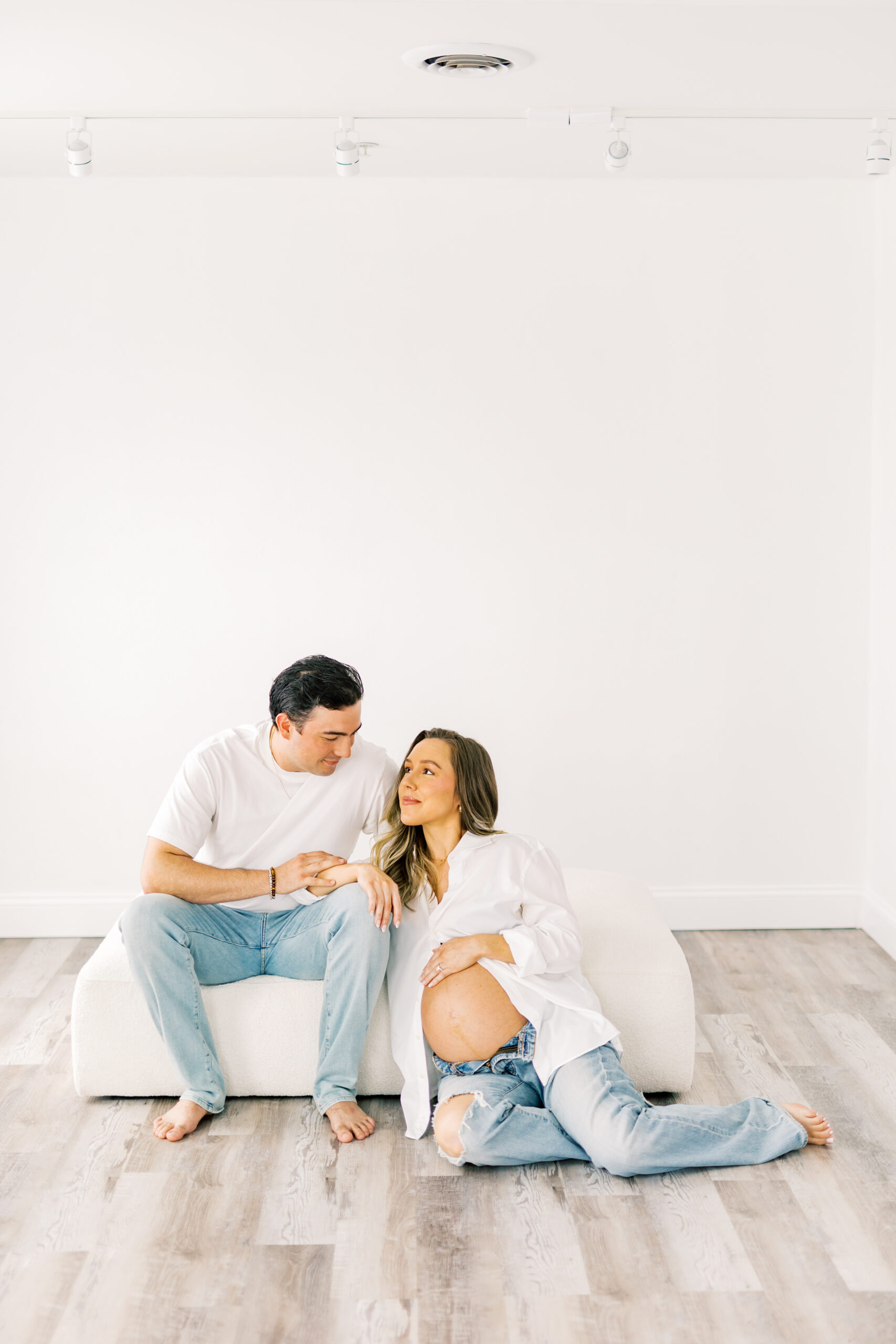 Dallas maternity photographer capturing glowing mom-to-be in Ivory Dahlia Studio