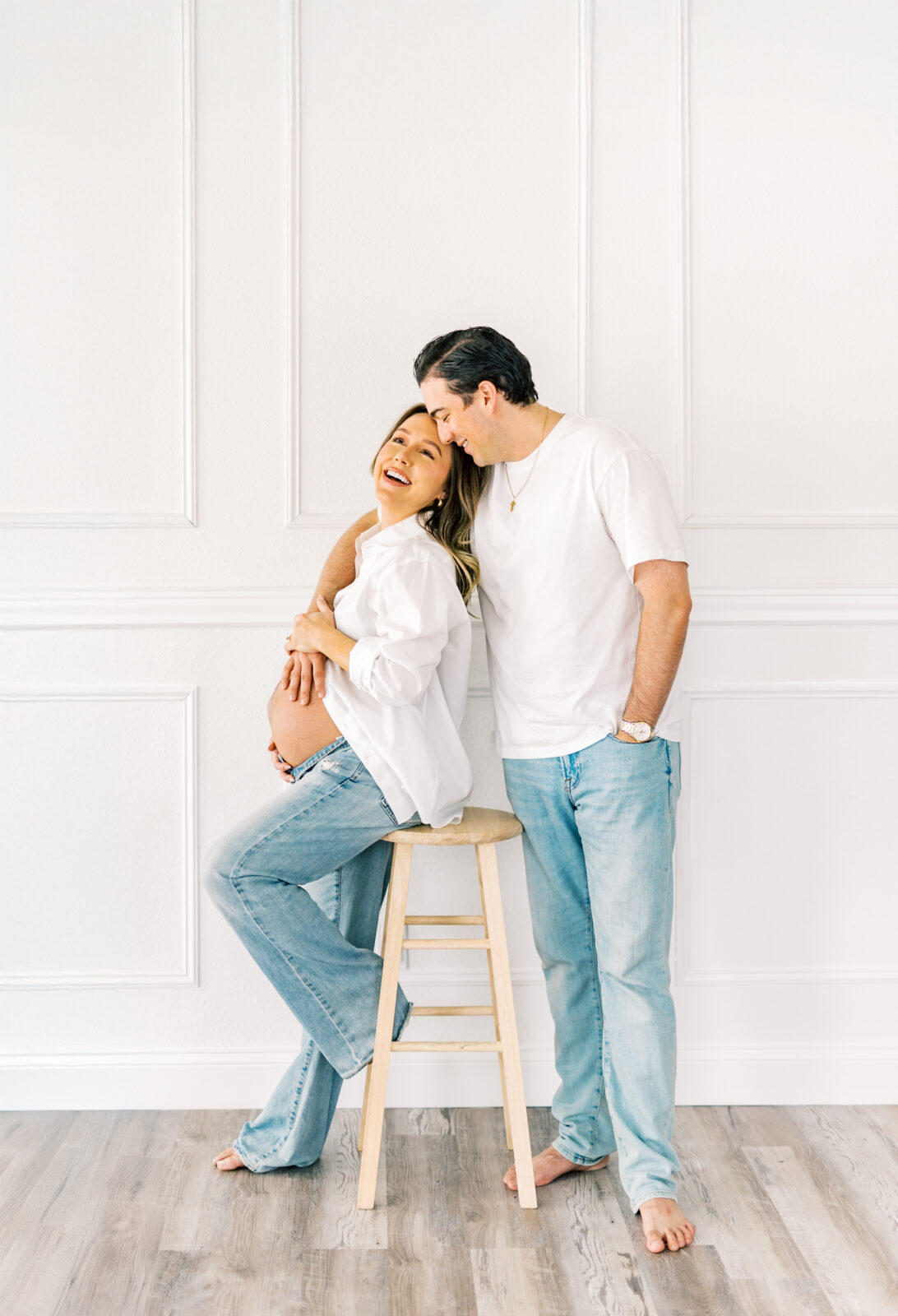 Expecting parents share laughter during Dallas maternity session