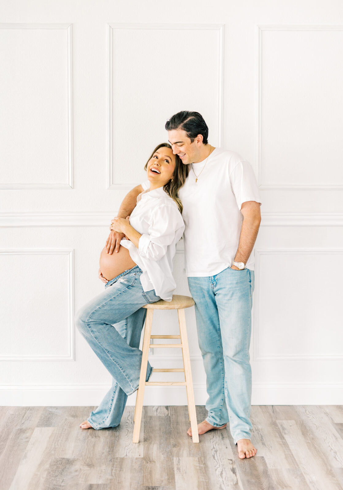 Expecting parents share laughter during Dallas maternity session