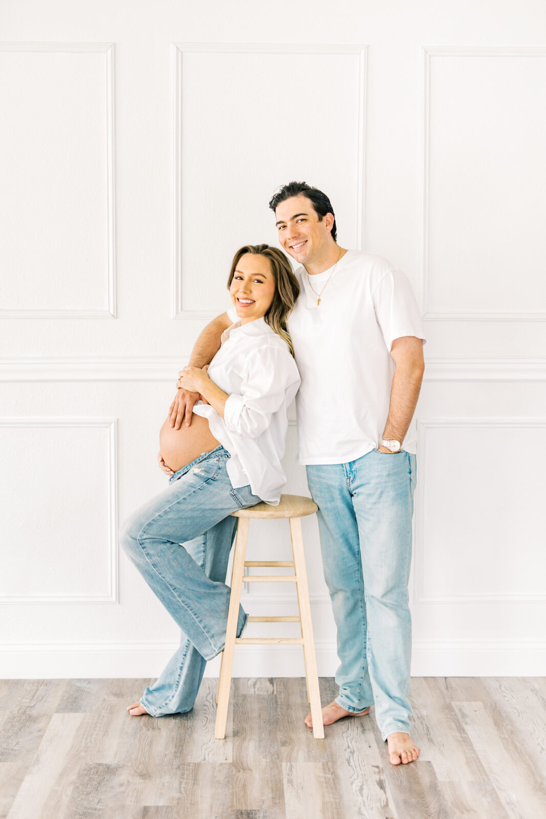 Intimate maternity photo of expecting parents embracing in Dallas Maternity Pictures