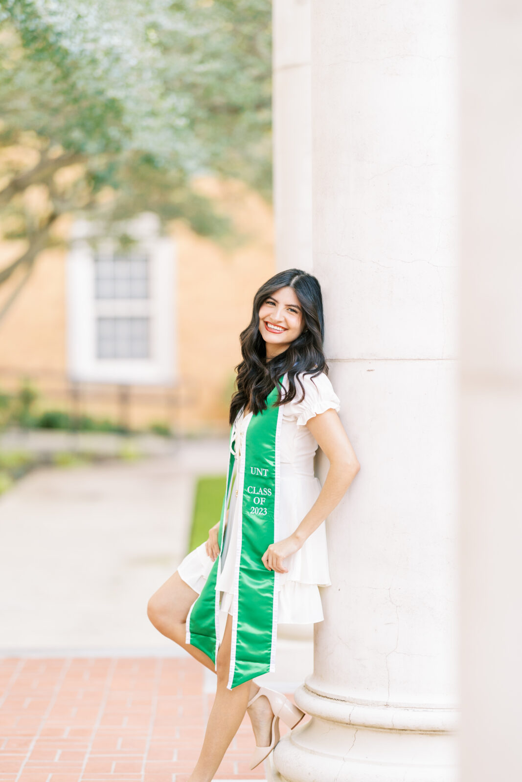 UNT senior portraits with graduation stole