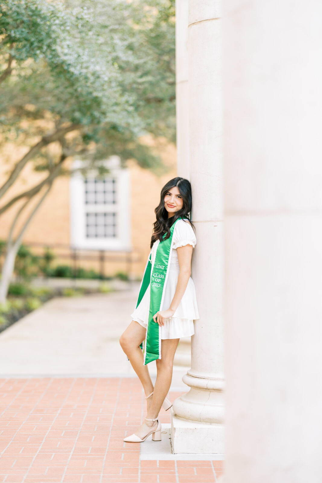 UNT senior portraits with graduation stole