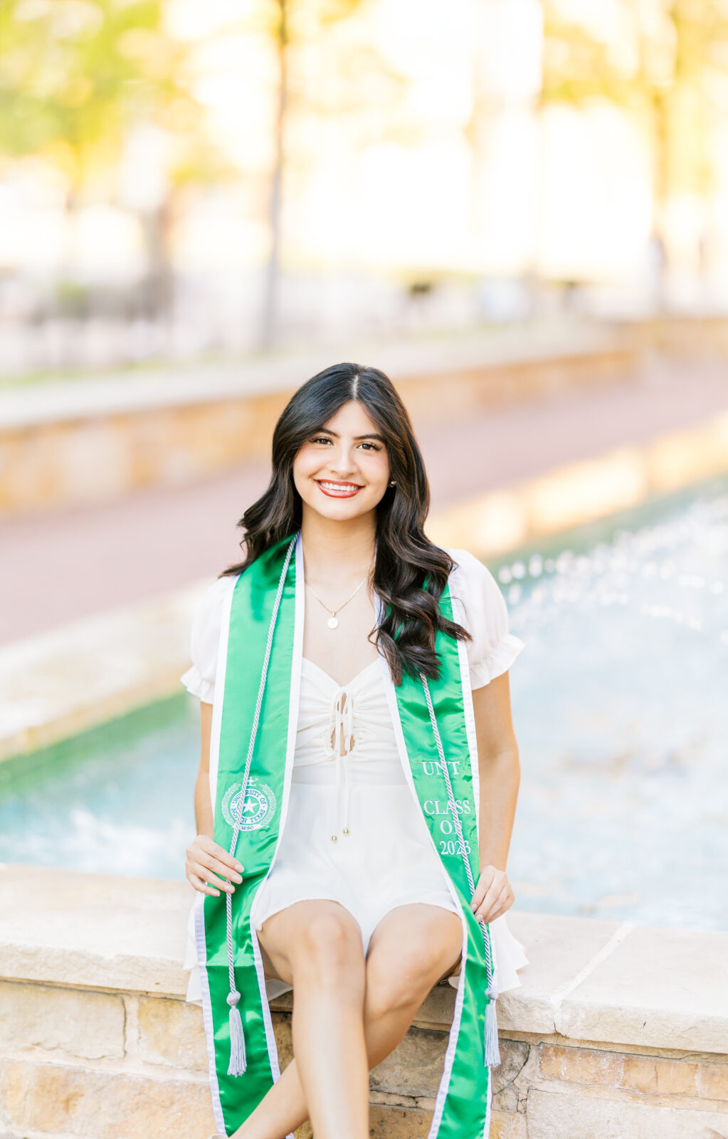 UNT senior portraits with graduation stole