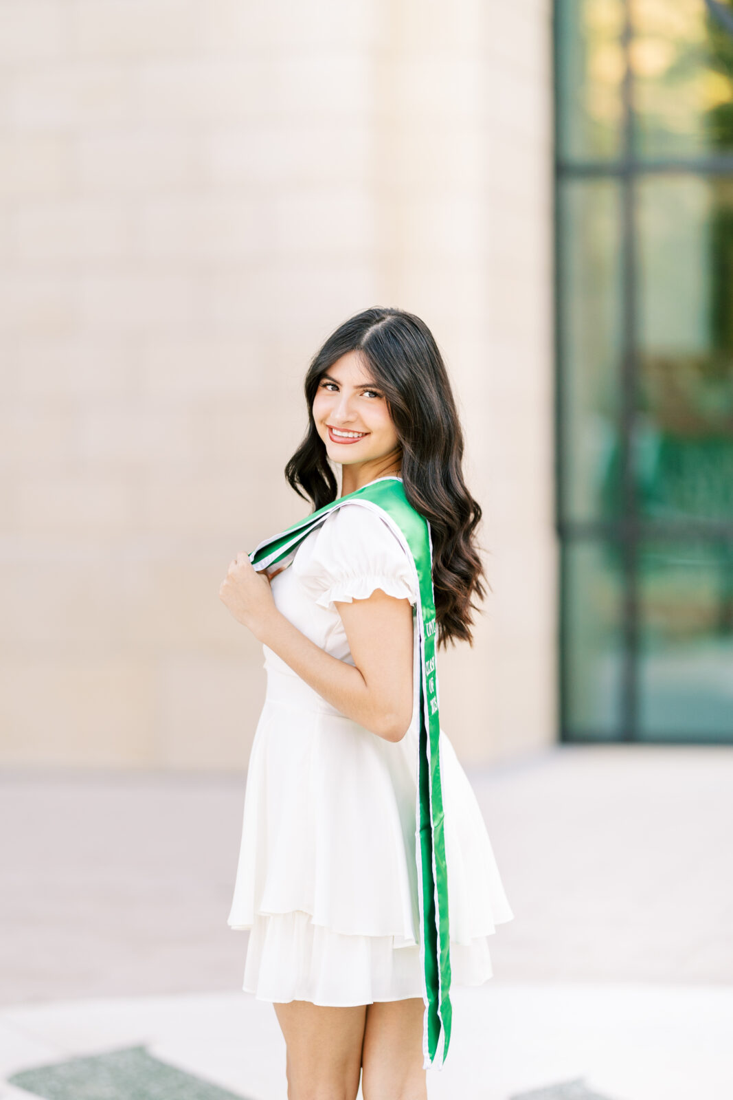 UNT senior portraits with graduation stole
