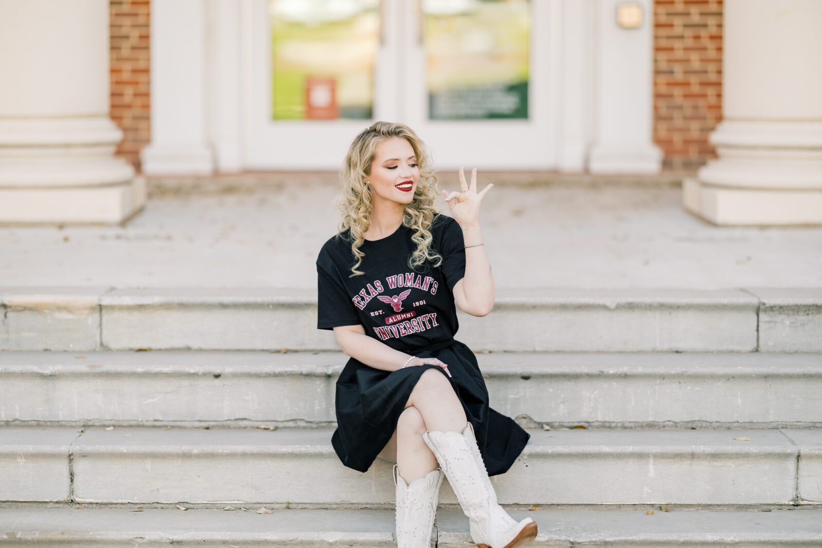 Avery in a TWU t-shirt and skirt during her graduation session.