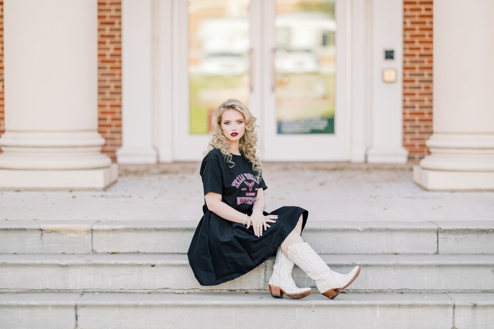 Avery in a TWU t-shirt and skirt during her graduation session.