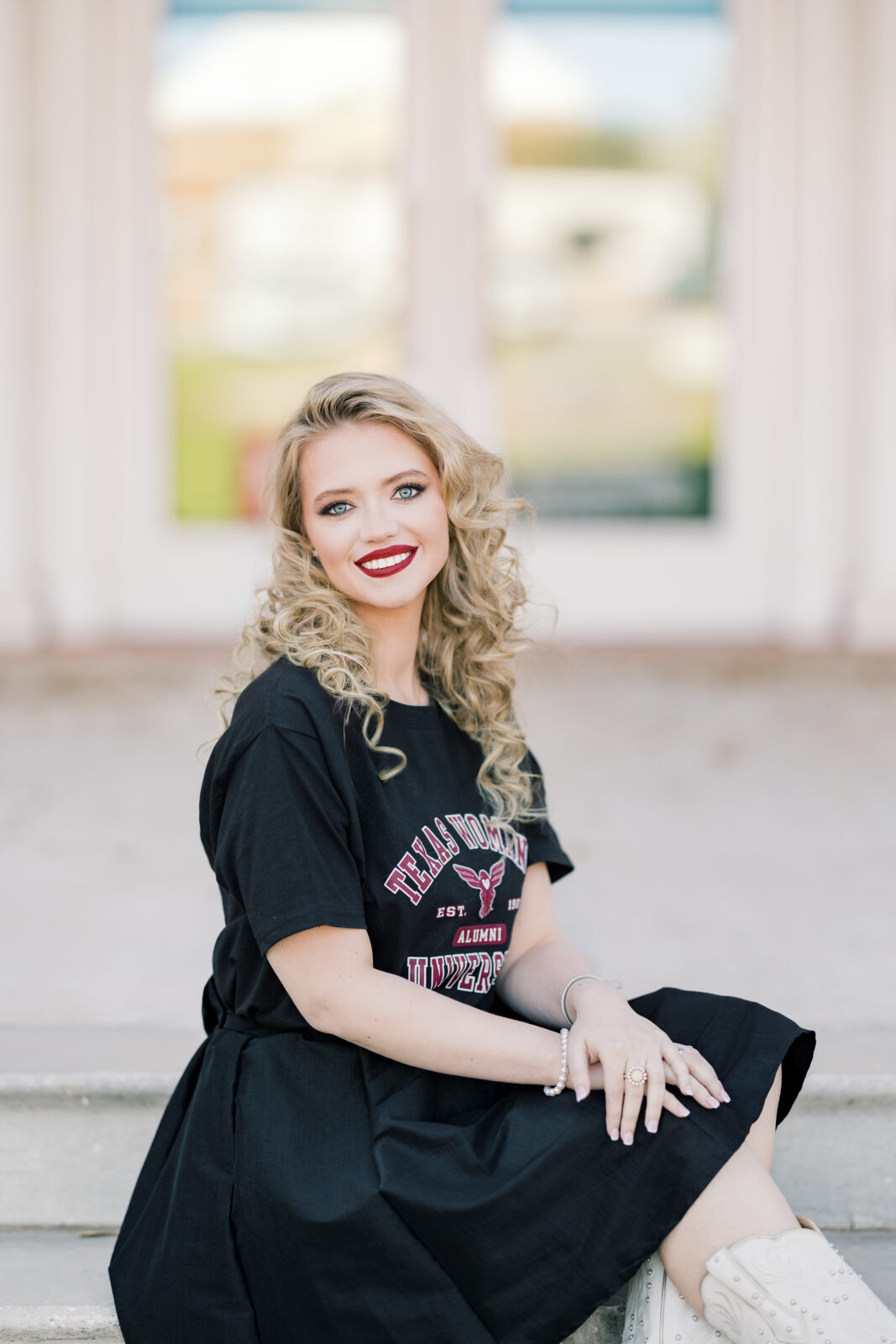 Avery in a TWU t-shirt and skirt during her graduation session.
