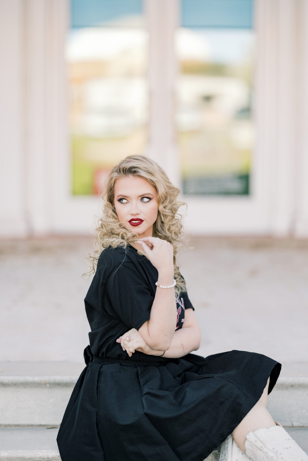 Avery in a TWU t-shirt and skirt during her graduation session.