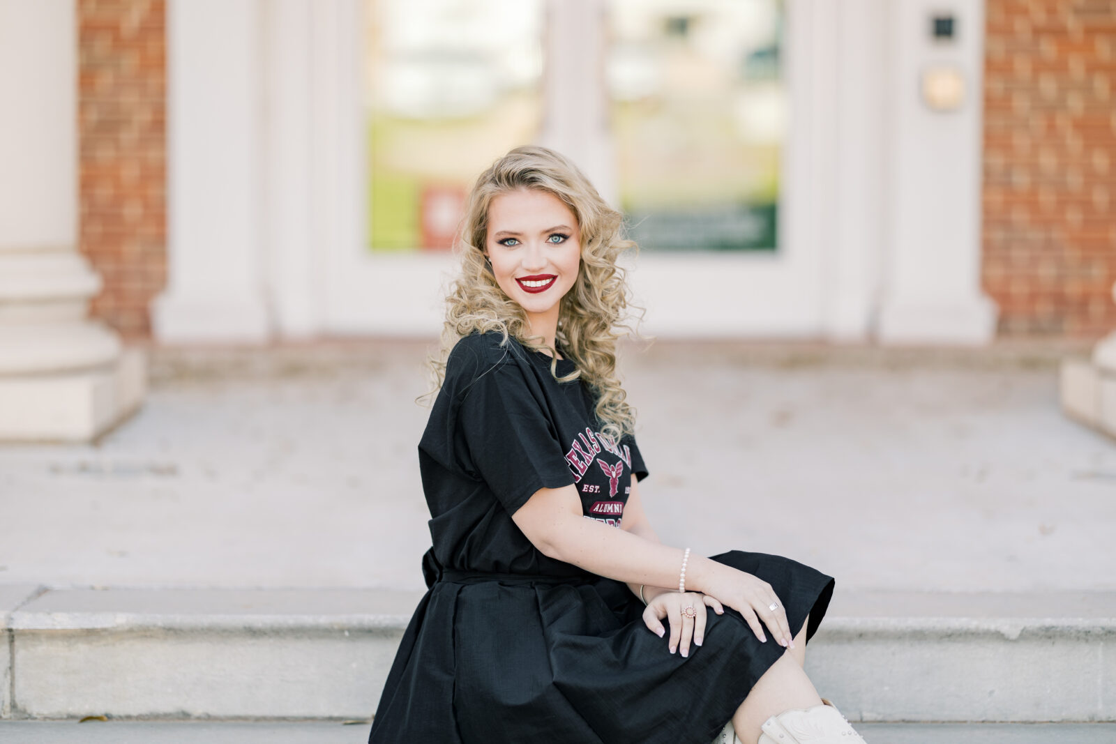 Avery in a TWU t-shirt and skirt during her graduation session.