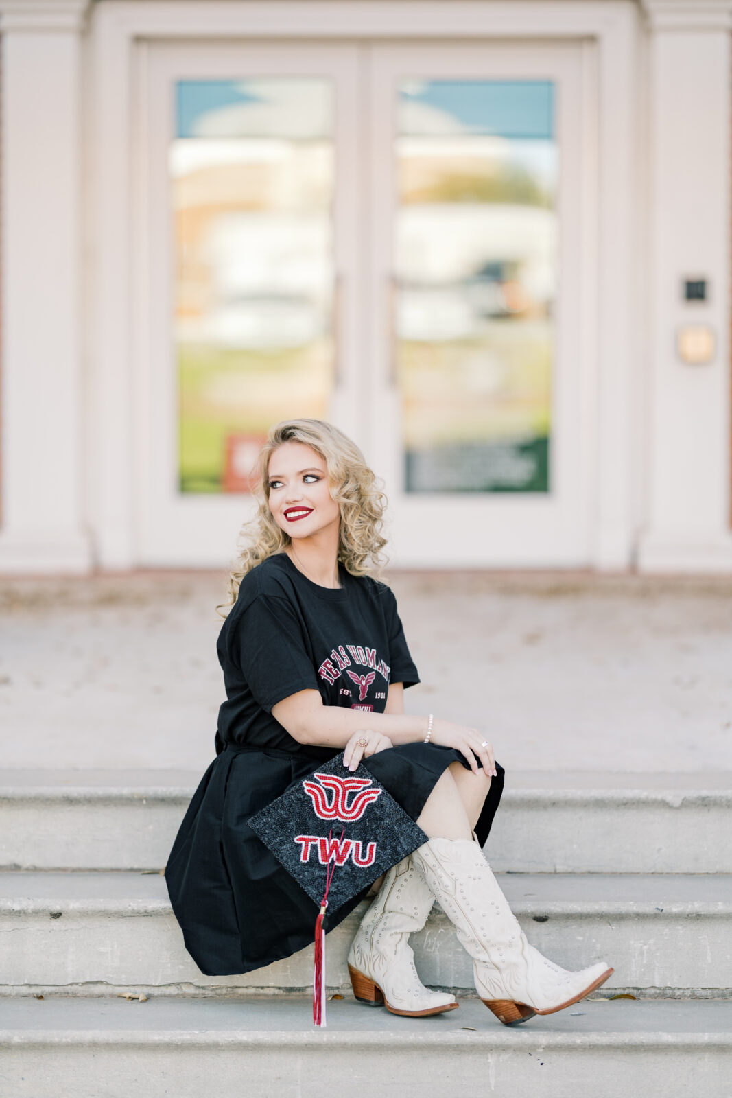 Avery in a TWU t-shirt and skirt during her graduation session.
