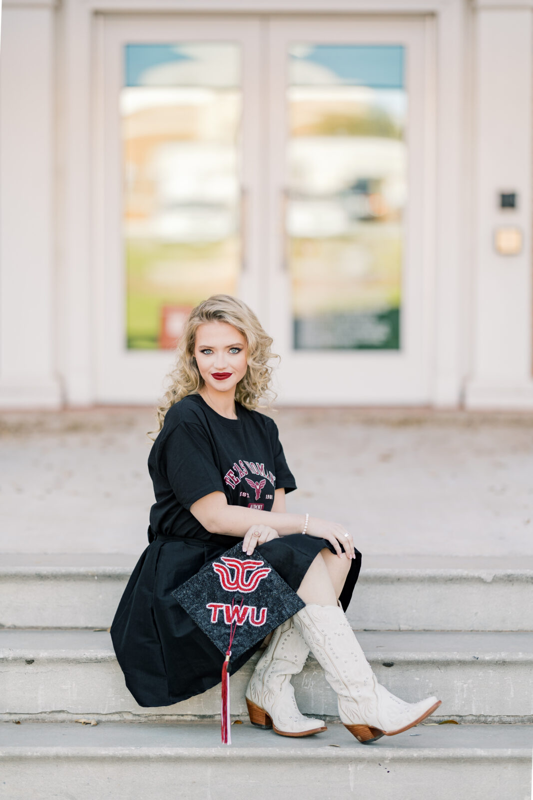 Avery in a TWU t-shirt and skirt during her graduation session.