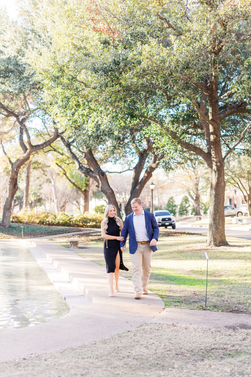 Surprise proposal at Flippen Park fountain in Highland Park, Texas.