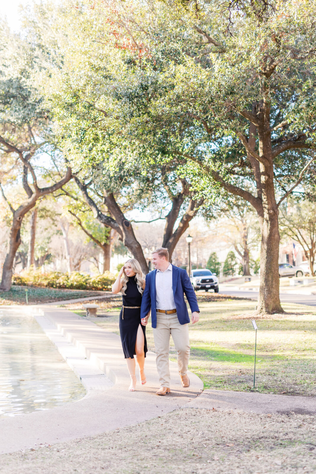 Surprise proposal at Flippen Park fountain in Highland Park, Texas.