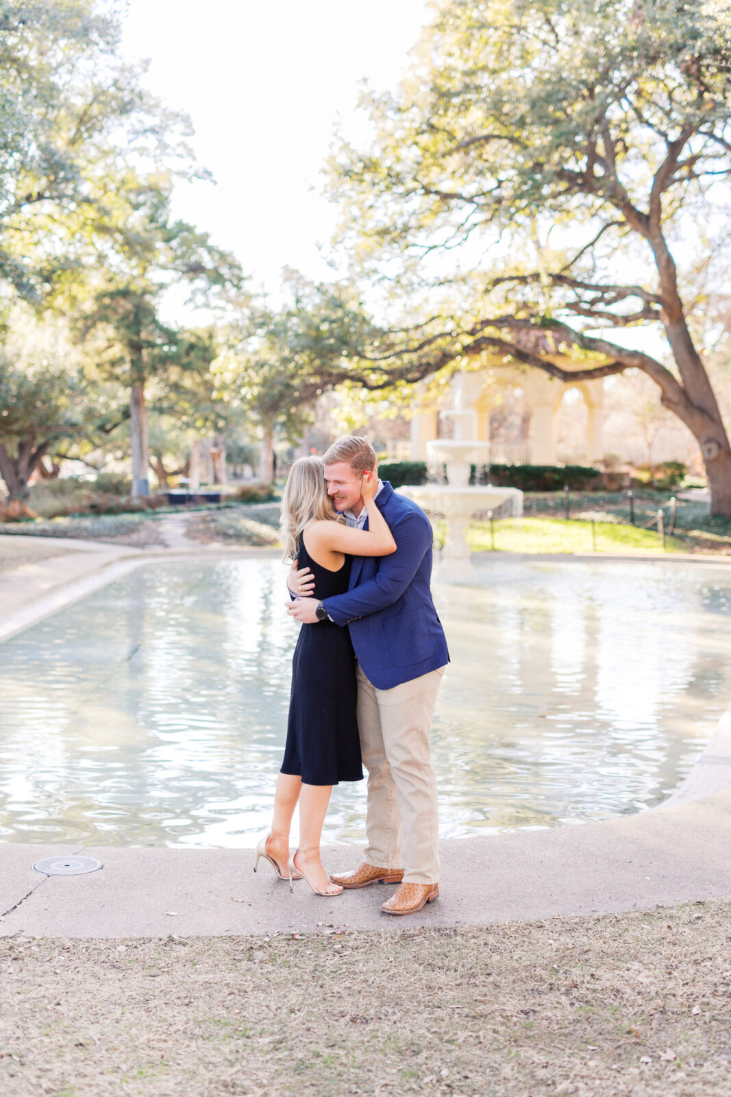 Surprise proposal at Flippen Park fountain in Highland Park, Texas.