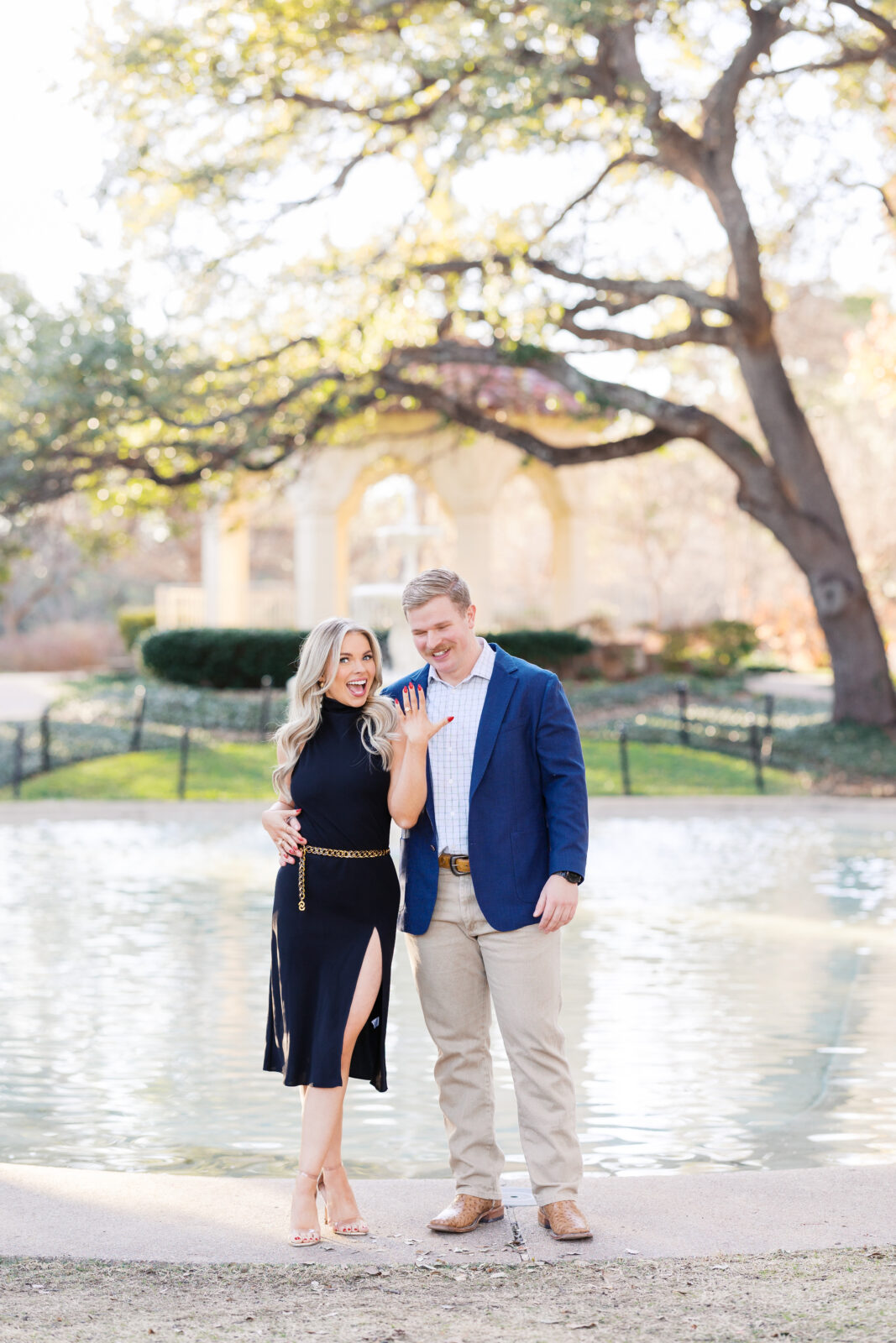 Surprise proposal at Flippen Park fountain in Highland Park, Texas.