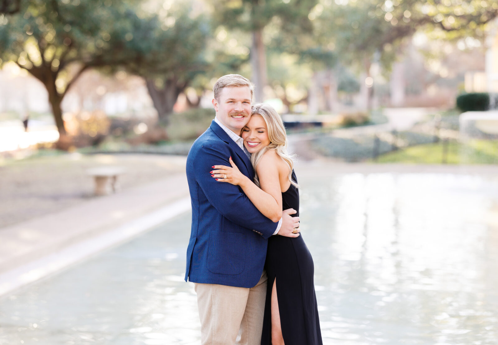 Surprise proposal at Flippen Park fountain in Highland Park, Texas.